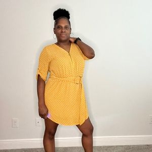 J for Justify, large, yellow dress with white polka dots